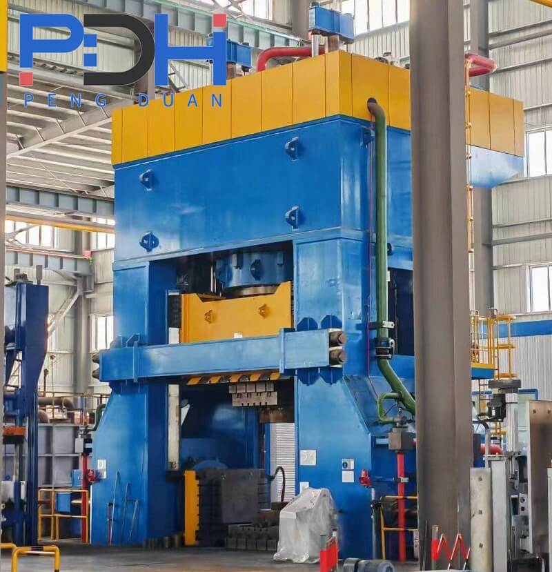 Multi-directional closed-die forging press for three-way valve body